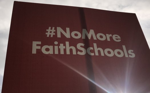 No More Faith Schools placard