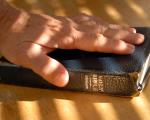 Hand on Bible