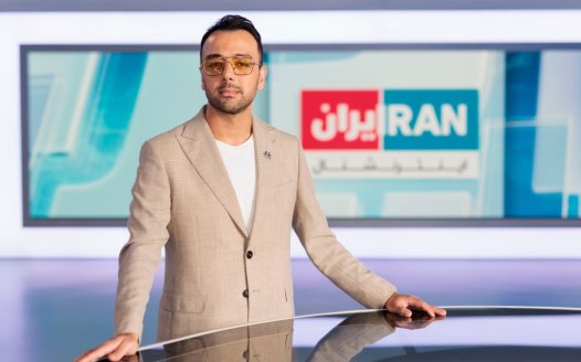 ‘I’m not scared’: the stabbed Iranian journalist who’s already back on air
